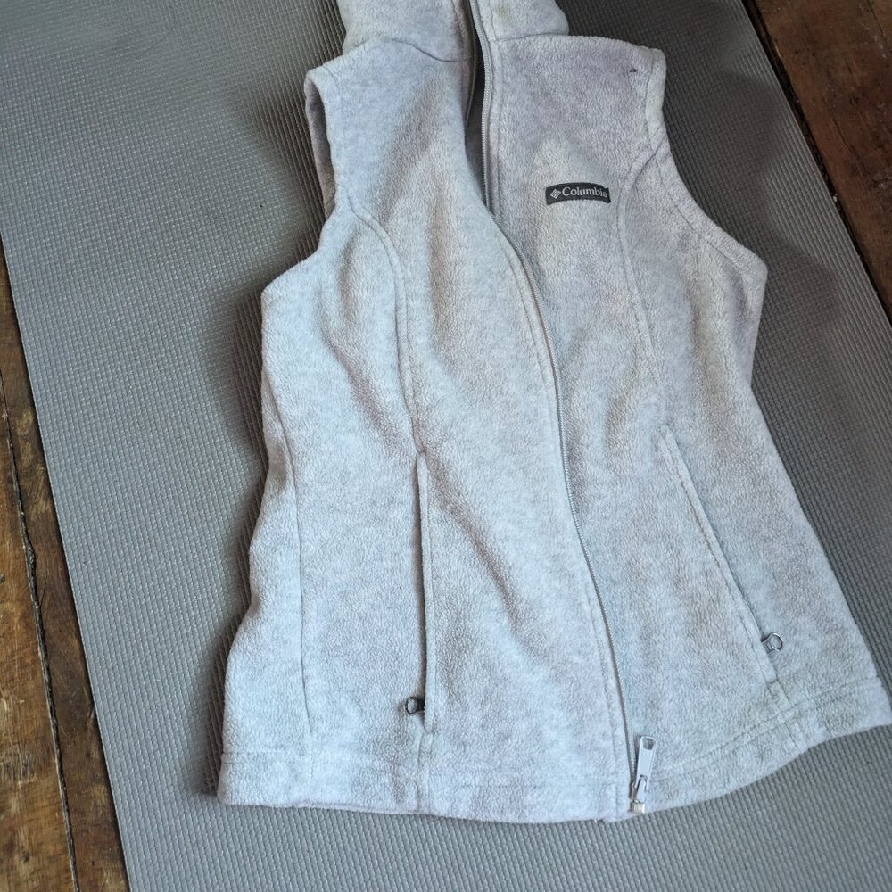Jeans and Columbia jacket without sleeves
